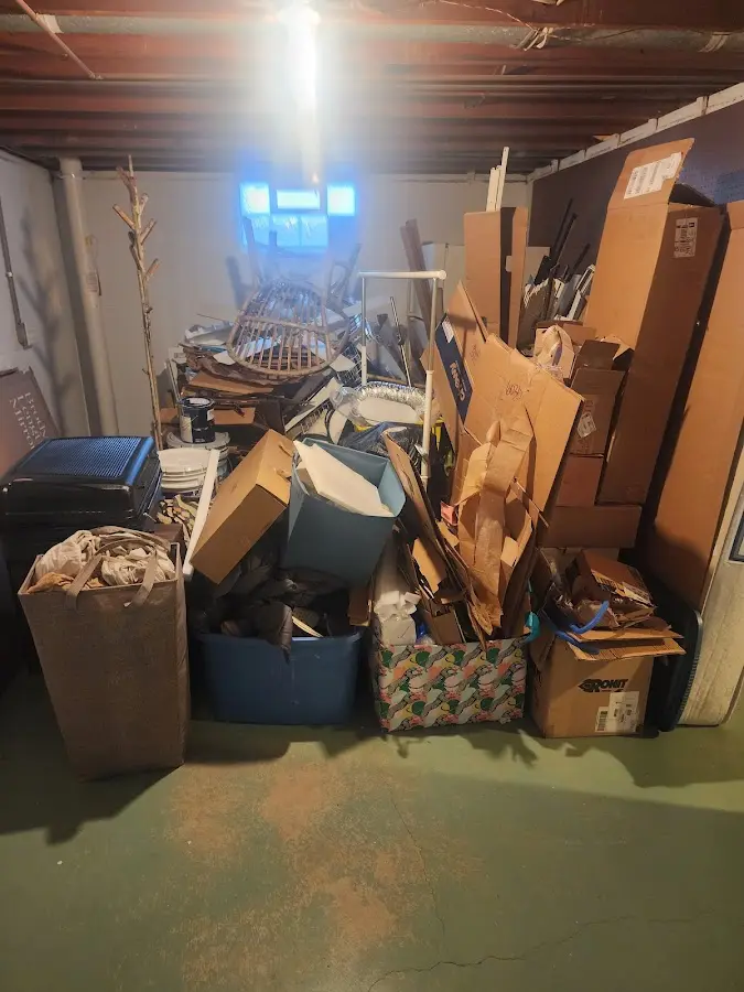 Roll-off dumpster container at job site for 2 Yard Dumpster Rental in Shaw Heights